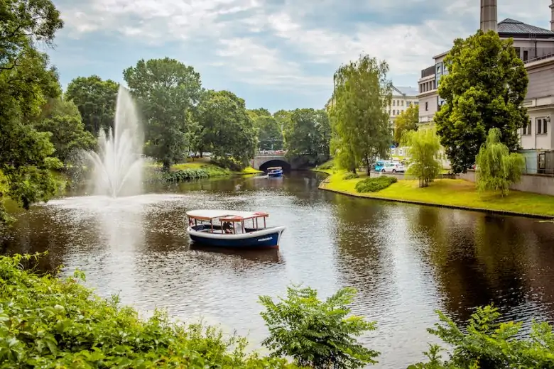 Boat in the Riga Canal – River Cruises Latvija - Boat in the Riga Canal – River Cruises Latvija